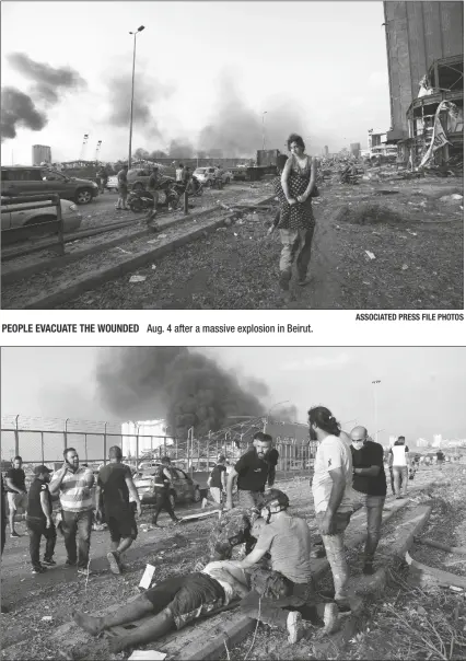  ?? ASSOCIATED PRESS FILE PHOTOS ?? PEOPLE EVACUATE THE WOUNDED
Aug. 4 after a massive explosion in Beirut.