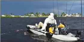  ?? (Arkansas Democrat-Gazette/Bryan Hendricks) ?? Jerry McBride of Panama City, Fla., crosses an inlet to Matlacha Island on Tuesday evening after getting caught in the open by Tropical Storm Eta.