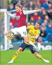  ?? AP ?? ■
Burnley's Jeff Hendrick (left) and Arsenal's Granit Xhaka.