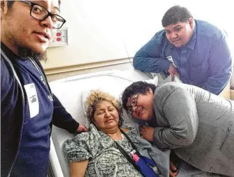  ?? Courtesy Abraham Pena ?? Abraham Peña, left, founder of Abe’s Fitty Foods, a company that creates prepared meals for Houstonian­s, is pictured with his mother Lourdes, who taught him to cook, and his brothers Gustavo and Rodolfo.