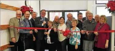  ?? REBECCA BLANCHARD — DIGITAL FIRST MEDIA ?? During a ribbon-cutting ceremony on Thursday, Dec. 1, BB&T announced the donation of three buildings to the Borough of Boyertown and a $120,000 grant to Building a Better Boyertown.