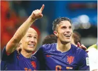  ??  ?? Freedom...Arjen Robben (left) and Robin Van Persie