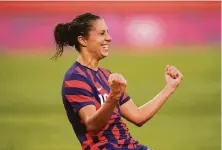  ?? Doug Mills / New York Times ?? Carli Lloyd celebrates one of the two goals she scored against Australia in the bronze-medal game at the Tokyo Olympics.