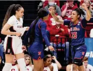  ?? Scott Strazzante/The Chronicle ?? Mississipp­i’s Angel Baker, right celebrates a victory over Haley Jones’ top-seeded Stanford on Sunday.