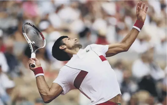  ??  ?? 2 Novak Djokovic serves during his win over Jaume Munar. The Serb hopes to see Andy Murray, inset below, back in action soon.