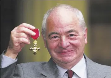  ?? JOHN STILLWELL/PA, FILE VIA AP ?? In 2000, author Colin Dexter was made an Officer of the Order of the British Empire for services to literature.