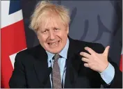  ?? PAUL GROVER — POOL PHOTO ?? Britain’s Prime Minister Boris Johnson speaks during a media briefing in Downing Street, London, on Thursday.