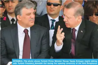  ??  ?? ISTANBUL: File photo shows Turkish Prime Minister Recep Tayyip Erdogan (right) talking with Turkish President Abdullah Gul during the opening ceremony of the third Bosphorus bridge in Istanbul. —AFP