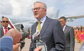  ?? (AFP) ?? Australia’s Prime Minister Anthony Albanese arrives at Ngurah Rai Internatio­nal airport in Denpasar on the Indonesian resort island of Bali on Monday