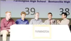  ?? LYNN KUTTER ENTERPRISE-LEADER ?? Members of Farmington’s ACE team react to winning the championsh­ip last week at the Farmington Performing Arts Center: Clayton Williamson (left), Weston Sills, Jonathan Brye, Joshua Jowers, Omar Qedan. Teams challenged several questions at the end of the game, so Farmington’s initial win came a little bit later after this photo.