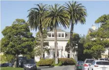  ?? Jessica Christian / The Chronicle ?? S.F. never billed the homeowners group for watering lush landscapin­g in the private Presidio Terrace’s common areas.