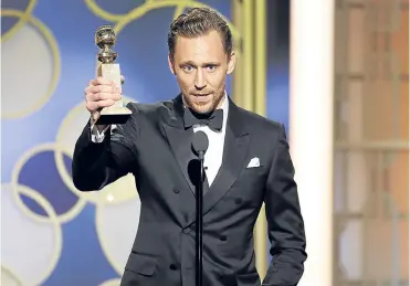  ??  ?? ▼
Tom Hiddleston, TV’s most notable hotel manager since Basil Fawlty...