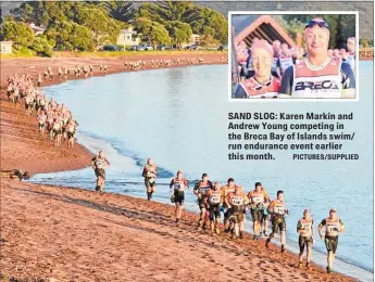  ?? PICTURES/SUPPLIED ?? SAND SLOG: Karen Markin and Andrew Young competing in the Breca Bay of Islands swim/ run endurance event earlier this month.