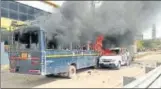  ?? HT ?? Police vehicles set ablaze in Rajasthan on Sunday by protesters demanding five percent quota for Gujjars.