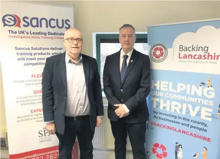  ??  ?? Mick Turner of Sancus Solutions with Clive Grunshaw, Lancashire’s Police and Crime Commission­er