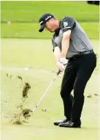  ??  ?? Ryan Palmer hits on the ninth fairway during the second round of the Honda Classic