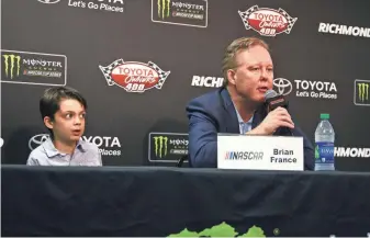  ?? SARAH CRABILL, GETTY IMAGES ?? NASCAR chairman Brian France, above, with son Luke, addressed Dale Earnhardt Jr.’s retirement. “He’s meant a lot to the sport in many, many ways,” he said.