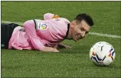  ?? CESAR MANSO — POOL VIA AP ?? Barcelona’s Lionel Messi lies on the ground during a Spanish La Liga match between Valladolid and Barcelona at the Jose Zorrilla stadium in Valladolid, Spain on Tuesday.