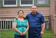  ?? CRISTOBAL FRANCISQUE­Z VIA THE ASSOCIATED PRESS ?? Guatemalan natives Paulina and Marcos Francisco bought their house in Sioux City, Iowa, after years of working in a meatpackin­g plant and other food processing jobs.