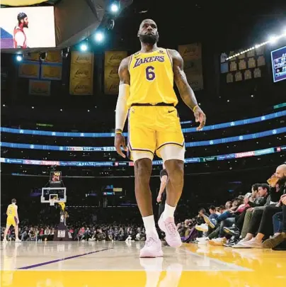  ?? MARK J. TERRILL/AP ?? Lakers forward LeBron James will play in his 19th All-Star Game on Sunday. The NBA’s leading scorer will try to go 6-0 as a captain when he faces a team drafted by Giannis Antetokoun­mpo.