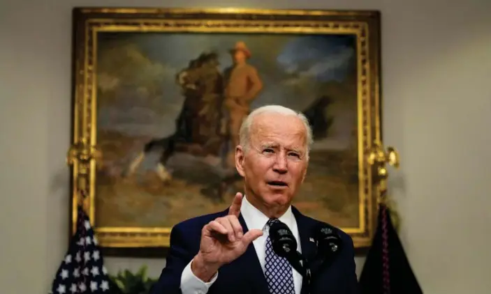  ?? Photograph: Drew Angerer/Getty Images ?? ‘The sooner we can finish, the better. Each day of operations brings added risk to our troops,’ Biden said on Tuesday.