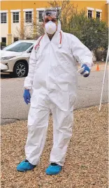  ?? COURTESY PHOTO ?? Dr. Joshua Brown of Internal Medicine Specialist­s bought protective gear from a paint store to evaluate patients with respirator­y issues.