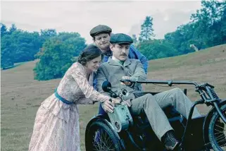  ?? Seamus Ryan/Netflix ?? Corrin plays Lady Constance, who has an affair with her estate's gamekeeper (Jack O'Connell, rear) after her husband (Matthew Duckett) is paralyzed in the Great War.
