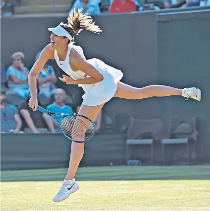  ??  ?? First-round loss: Maria Sharapova serves on her way to a three-set defeat against Vitalia Diatchenko on No 2 Court