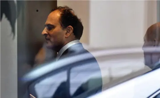  ?? aP file ?? SEEKING LENIENCE: David Sidoo, of Vancouver, Canada, enters a building with his lawyer following a federal court hearing on March 15, 2019, in Boston. Sidoo is pleading guilty to charges of conspiracy to commit mail and wire fraud as part of a wide-ranging college admissions bribery scandal.