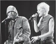  ?? MARIE-FRANCE COALLIER/ GAZETTE FILES ?? Daniel Lanois, left, leads the group Black Dub here with singer Trixie Whitley, right, in concert at Place des Arts on the last night of the Montreal Internatio­nal Jazz Festival in 2011.