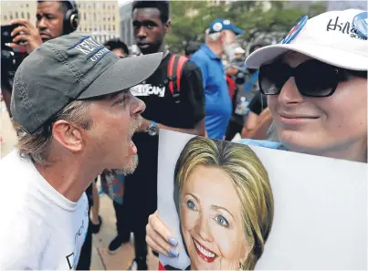  ?? Picture: PA. ?? Demonstrat­ors square off during a rally outside City Hall in Philadelph­ia during the third day of the Democratic National Convention.