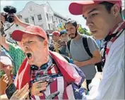  ??  ?? A DEMONSTRAT­OR argues with counterpro­testers after Yiannopoul­os’ speech. Eleven people were arrested Sunday, campus and city police said.