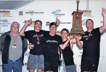  ?? Photo: Steve Huntley ?? Champions: Russell Johnson, left, presents the Leigh Johnson Trophy to the Sapphire crew Aiden Cuff, Tim Pickford, Lachy Nix and Brian Griffin after they won the Southern 80.