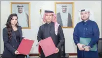  ?? ?? The MoU was signed by PSA Assistant President Mohammed Abdulaziz Al Naimi and General Manager of Microsoft Doha Lana Khalaf.