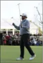  ?? RYAN KANG — THE ASSOCIATED PRESS ?? J.B. Holmes celebrates after making his putt on the 18th green to win the Genesis Open golf tournament at Riviera Country Club on Sunday in the Pacific Palisades area of Los Angeles.