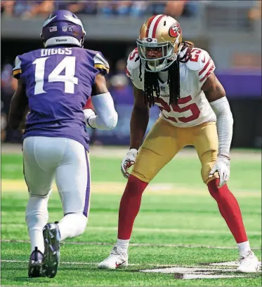  ?? [BRUCE KLUCKHOHN/THE ASSOCIATED PRESS] ?? 49ers defensive back Richard Sherman, right, lines up to defend Vikings wide receiver Laquon Treadwell during the first half of a Sept. 9 game in Minneapoli­s.