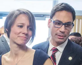  ?? RYAN REMIORZ / THE CANADIAN PRESS ?? Quebec politician Gerry Sklavounos and wife, Janneke, who performed her duty in service of her husband’s comeback by staying poker faced during his press conference.