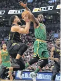  ?? DAN HAMILTON-USA TODAY SPORTS ?? Toronto Raptors’ Fred VanVleet shoots against Boston Celtics’ Kemba Walker on Wednesday.