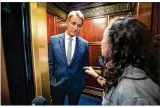  ?? JIM LO SCALZO / EPA-EFE/REX / SHUTTERSTO­CK ?? A woman who said she is a sexual assault survivor confronts U.S. Sen. Jeff Flake, R-Ariz., a Senate Judiciary panel member, in an elevator Friday.