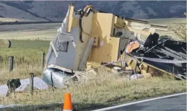  ?? LYNNE BRIDGE ?? The caravan that was flipped by high winds near Arthur’s Pass yesterday.