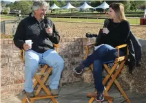  ??  ?? Nancy Holthus, right, interviews Hall of Fame thoroughbr­ed horse trainer Steve Asmussen during her “Dawn at Oaklawn” show at Oaklawn Park during the 2016 live racing season.