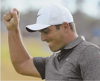  ?? AP PHOTO ?? MAJOR ACCOMPLISH­MENT: Francesco Molinari celebrates after finishing off his British Open victory on Sunday at Carnoustie, his first major championsh­ip.