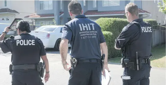  ??  ?? The Integrated Homicide Investigat­ion Team was at the scene of a fatal shooting at 14300 block of 90A Avenue in Surrey investigat­ing a ‘targeted attack’ that left one man dead and a second man in hospital. There have been more than 45 shootings this...