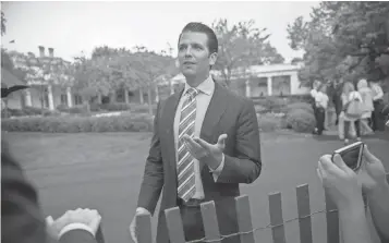  ?? SHAWN THEW, EUROPEAN PRESSPHOTO AGENCY ?? Donald Trump Jr. talks to reporters during the White House Easter Egg Roll on April 17, 2017.