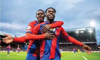 ?? Photograph: Sebastian Frej/MB Media/Getty Images ?? Crystal Palace’s Jeffrey Schlupp (right) celebrates with Tyrick Mitchell after scoring his side’s third goal against Norwich at Selhurst Park.