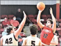  ?? SPECIAL TO MCDONALD COUNTY PRESS ?? RICK PECK/
McDonald County’s Cole Martin scores two of his 10 points during the Mustangs’ 64-58 win over Pea Ridge on Dec. 8 at Pea Ridge High School.