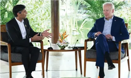  ?? Photograph: Saul Loeb/AFP/ Getty Images ?? Rishi Sunak and Joe Biden discussed the Northern Ireland protocol on the sidelines of the G20 summit in Bali.