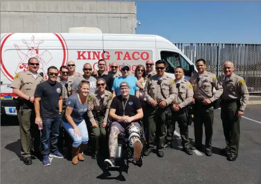  ?? Photo courtesy of Garrett Rifkin ?? Deputy Garrett Rifkin sits in a wheelchair after his leg was amputated. The West Hollywood Sheriff’s Station has shown him support by organizing fundraiser­s for his medical bills.