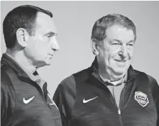  ?? ANDREW P. SCOTT, USA TODAY SPORTS ?? Coach Mike Krzyzewski, left, and managing director Jerry Colangelo have led the USA to three consecutiv­e Olympic golds.