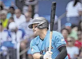  ?? ALIE SKOWRONSKI askowronsk­i@miamiheral­d.com ?? Jake Burger, who leads the Marlins in RBI and is tied for the team lead in home runs, was removed from Sunday’s game after the third inning because of left oblique discomfort.